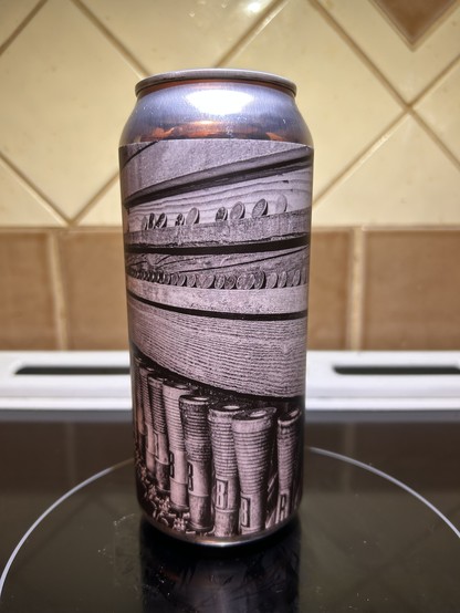 The back of the can has a picture of the Brassneck taps and its coin collection