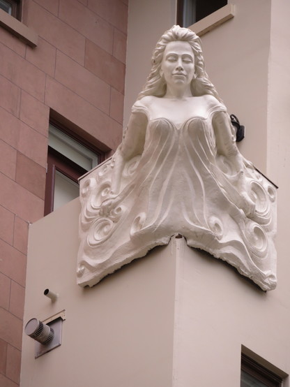 Figurehead - this looks like it would be more at home on the prow of a ship. It is one of two identical installations on a  residential building
in Vancouver's downtown Richards Street 