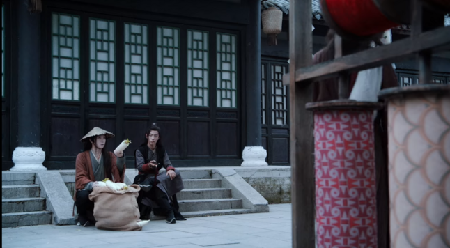 Wen Ning sitting on a stairs with a turnip in his hand, Wei Wuxian sitting next to him. They are in town. 