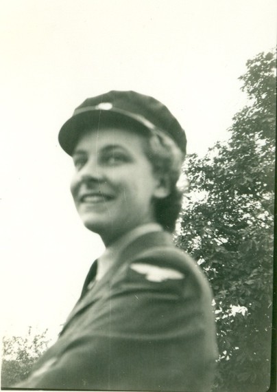 An old black and white photo of a young woman in WRAF uniform early 1940's