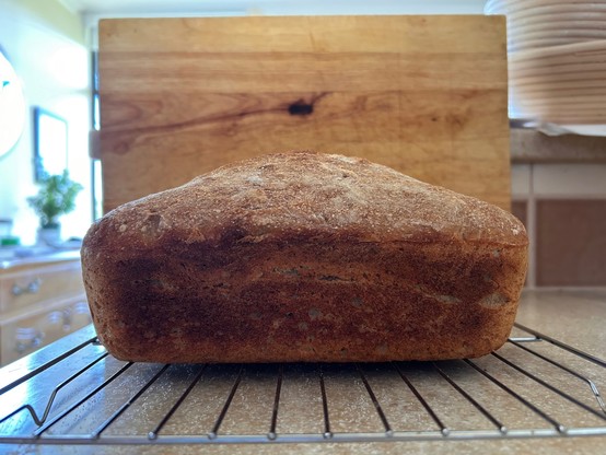 Side view showing the height the loaf rose above the rim of the tin