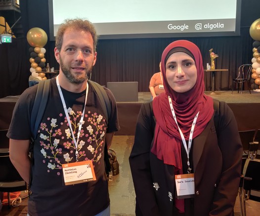 Sara on the right, a humbled yours truly on the left, in front of the CSS Day conference stage.