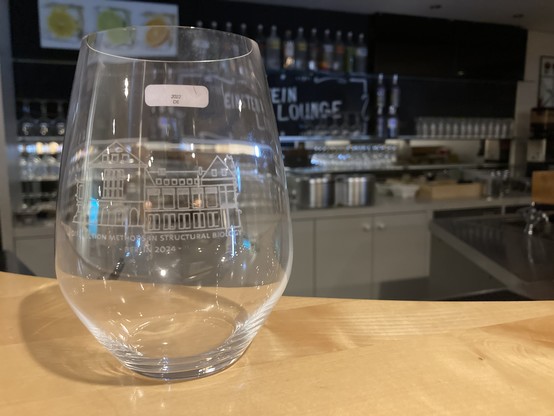 A glass etched with 