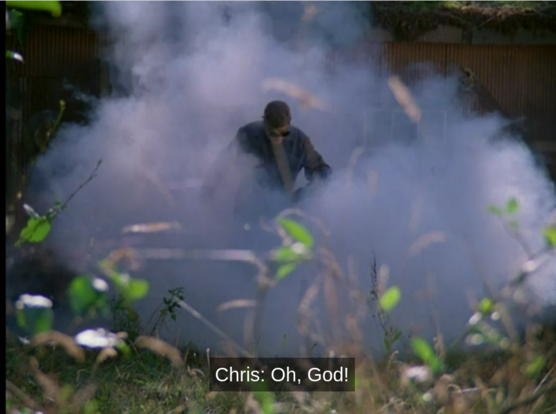 Screenshot from Northern Exposure, Chris is emerging from a cabin in a cloud of smoke. He's wearing welding goggles. Chris says, 