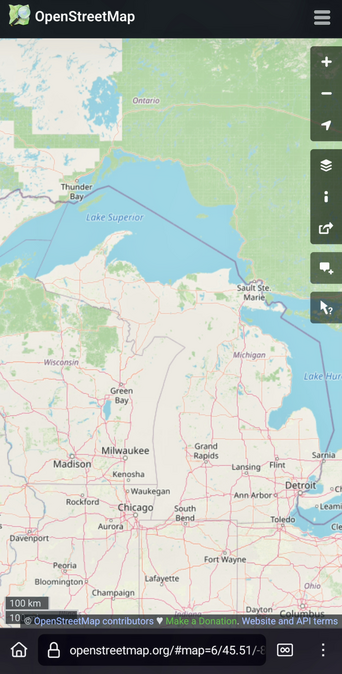 Mobile browser screenshot of the northern Midwest united states from openstreetmap.org. Lake Michigan is conspicuously missing from the Great Lakes. 