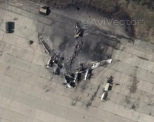 Satellite image of a totally  burned russian bomber