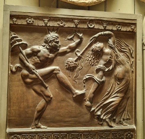 Cast of a frieze showing Dionysus and a drunken lass.