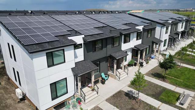 A row of town houses with solar panels on their rooves.

These townhouses in Edmonton's Blatchford neighbourhood generate solar power and store it in batteries. They're part of a virtual power plant network that can feed power back to the grid. Proponents say VPPs make it possible to add more wind and solar to the grid by filling gaps when it's not windy or sunny. (Landmark Homes)

