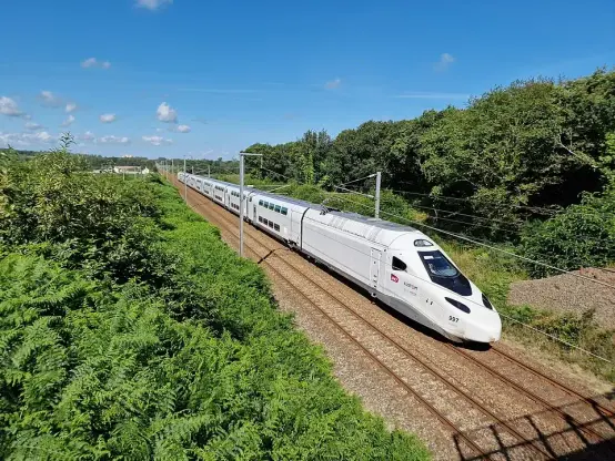 SNCF Voyageurs, France's passenger rail operator, which has just started running Alstom TGV-M trainsets, is part of the consortium that will build Canada's high-speed rail line; shovels could be in the ground in four years.

The train is white with double-decker cars and electric overhead catenary for a power source  
